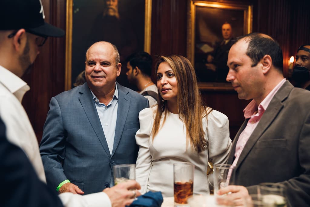 Attendees conversing at a UN Blockchain Week gala reception