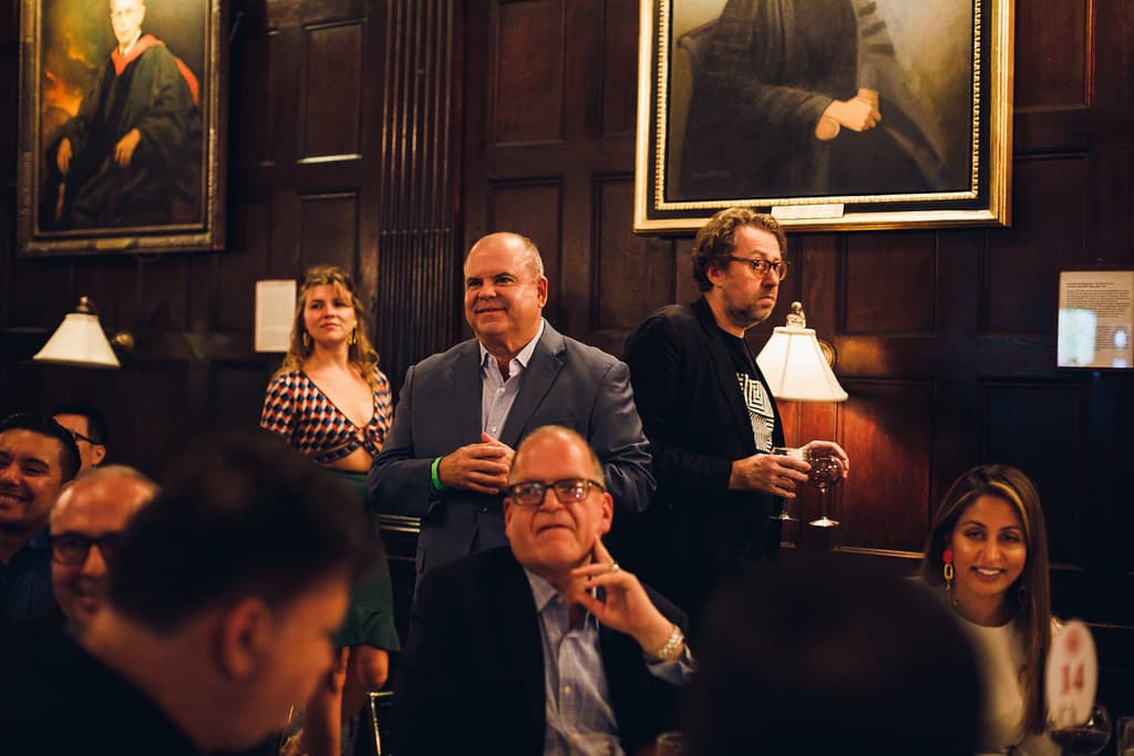 Attendees networking at a UN Blockchain Week reception